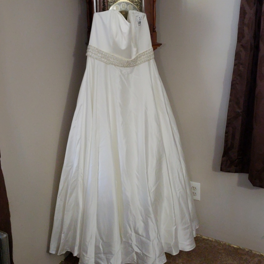 Wedding dress and undergarments.  NEVER WORN